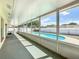 Enclosed lanai overlooks the pool, perfect for relaxation and shade at 601 Francis St, Kissimmee, FL 34741