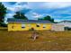 The backyard has a shed for extra storage at 606 E Central Ave, Eagle Lake, FL 33839
