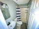 Cozy bathroom featuring a standing shower and a vanity at 606 E Central Ave, Eagle Lake, FL 33839
