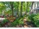 Picturesque backyard path features lush tropical plants and trees at 617 Red Oak Cir # 121, Altamonte Springs, FL 32701