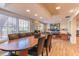 Bright dining room with a large table, big windows, and a floral centerpiece at 617 Red Oak Cir # 121, Altamonte Springs, FL 32701