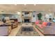 Inviting living room featuring a brick fireplace, comfortable seating, and stylish decor at 617 Red Oak Cir # 121, Altamonte Springs, FL 32701