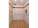 Spacious, accessible tiled shower with grab bars and mosaic accents at 617 Red Oak Cir # 121, Altamonte Springs, FL 32701