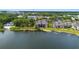 Scenic aerial shot of lakeside condos surrounded by trees, offering peaceful waterfront living at 652 Lake Villas Dr # D, Altamonte Springs, FL 32701