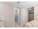 Bathroom with granite counter, toilet room and walk in closet at 652 Lake Villas Dr # D, Altamonte Springs, FL 32701