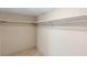 Walk-in closet with carpeted floor and clothes rack at 652 Lake Villas Dr # D, Altamonte Springs, FL 32701