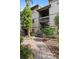 Charming condo building featuring a brick walkway surrounded by lush landscaping at 652 Lake Villas Dr # D, Altamonte Springs, FL 32701