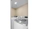 Bright laundry room featuring modern, front-loading washer and dryer for convenient chores at 652 Lake Villas Dr # D, Altamonte Springs, FL 32701