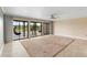 Inviting living room featuring large sliding doors that showcase scenic water views at 652 Lake Villas Dr # D, Altamonte Springs, FL 32701