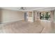 Open living space with seamless flow to kitchen and expansive views through sliding glass doors at 652 Lake Villas Dr # D, Altamonte Springs, FL 32701