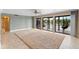 Bright living area with access to balcony, offering serene water views at 652 Lake Villas Dr # D, Altamonte Springs, FL 32701
