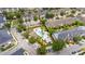Overhead perspective of the pool, clubhouse, and meticulously designed landscaping in the community at 704 Grado Pt, Oviedo, FL 32765