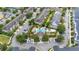 Aerial view showcasing the community pool, surrounding residences, and well-manicured grounds at 704 Grado Pt, Oviedo, FL 32765