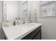 Stylish bathroom with quartz countertop, modern fixtures, and natural light at 704 Grado Pt, Oviedo, FL 32765