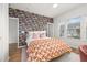 Bedroom showcasing bold wallpaper, neutral accents, and an inviting atmosphere for relaxation at 704 Grado Pt, Oviedo, FL 32765