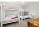 Spacious bedroom featuring bunk beds and modern decor at 704 Grado Pt, Oviedo, FL 32765