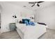 Bedroom with a bed, ceiling fan, and side tables at 704 Grado Pt, Oviedo, FL 32765