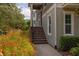 Charming townhome with meticulously maintained landscaping and a welcoming entrance, perfect for a modern lifestyle at 704 Grado Pt, Oviedo, FL 32765