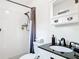 Updated bathroom features a tiled shower and black fixtures at 7374 Circle Dr, Lady Lake, FL 32159