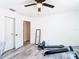 Bedroom with sleek floors, closet, and natural light at 7374 Circle Dr, Lady Lake, FL 32159