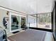 Covered patio area with outdoor dining and relaxing space at 7374 Circle Dr, Lady Lake, FL 32159