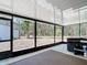 The spacious screened-in porch features lots of light and a hot tub at 7374 Circle Dr, Lady Lake, FL 32159