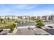 Aerial view showcasing the community's parking, amenities, green spaces and overall layout at 7565 Laureate Blvd # 3408, Orlando, FL 32827