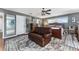 Bedroom featuring a neutral color scheme, a comfortable bed and wood accents at 819 E Harbour Ct, Ocoee, FL 34761