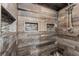 Modern walk-in shower featuring beautiful pebble stone flooring and neutral tile at 819 E Harbour Ct, Ocoee, FL 34761