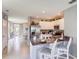 Bright kitchen featuring stainless steel appliances and a granite-topped island with barstool seating at 8383 Madrid St, Lakeland, FL 33810