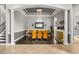 Formal dining room features a stylish chandelier, contemporary decor, and seating for eight at 9032 Tavolini Ter, Windermere, FL 34786