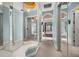 Hallway with mirrored walls leading to bedroom at 9032 Tavolini Ter, Windermere, FL 34786