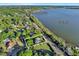 Stunning aerial view of lakeside home near Downtown Mount Dora and the Mount Dora Yacht Club at 996 Fairview Ave, Mount Dora, FL 32757