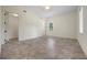 A bedroom with tile floors, a ceiling fan, and natural light at 996 Fairview Ave, Mount Dora, FL 32757
