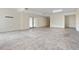 Large living area with tile flooring and access to the garage and side yard at 996 Fairview Ave, Mount Dora, FL 32757