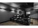 Home theater featuring premium leather seating, projector and custom lighting at 996 Fairview Ave, Mount Dora, FL 32757