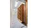 Functional wine storage room featuring custom wooden wine racks and ample space at 996 Fairview Ave, Mount Dora, FL 32757