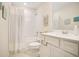 Cozy bathroom with a shower-tub combo, decorative wall art, and vanity sink at 10940 Leafshore Loop, Orlando, FL 32829