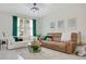 Cozy living room with modern furniture, bright lighting, and stylish decor creates a warm atmosphere at 10940 Leafshore Loop, Orlando, FL 32829