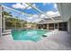 Sparkling screened-in pool perfect for relaxation and outdoor enjoyment at 1130 Woodchuck Ct, Orange City, FL 32763