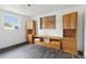 Unfurnished room with vintage cabinets and laminate floors that need repair at 114 Spring Lake Cir, Ocoee, FL 34761