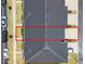 Birds eye view of roof of a multi-Gathering home surrounded by driveways, grass and streets at 11607 Sunsail Ave, Orlando, FL 32832