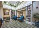 Cozy community library with floor to ceiling bookshelves, comfortable seating and stylish decor at 11908 Fiore Dr # 1, Orlando, FL 32827