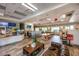 Relaxing community lounge area featuring coffee bar, ample seating, and charming decorative accents at 11908 Fiore Dr # 1, Orlando, FL 32827