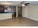 Spacious living room with an open layout, seamlessly connects with the kitchen and dining areas at 135 Heritage Park St, Winter Springs, FL 32708