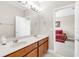 Bathroom with double sink vanity at 1545 Caterpillar St, St Cloud, FL 34771
