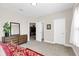 Bedroom with a mirror, a dresser and two doors at 1545 Caterpillar St, St Cloud, FL 34771