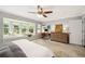 Spacious bedroom with a bay window seat, desk area, and natural light at 1624 Park Lake St, Orlando, FL 32803