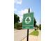 Welcoming Colonialtown North sign with lush greenery along a sunny street at 1624 Park Lake St, Orlando, FL 32803