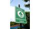Community welcome sign for Colonialtown North neighborhood under a sunny sky at 1624 Park Lake St, Orlando, FL 32803